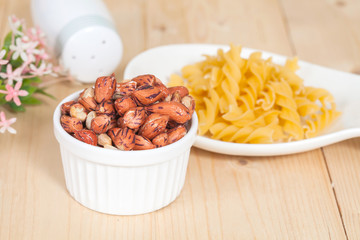 Tiger peanut in bowl on wood table