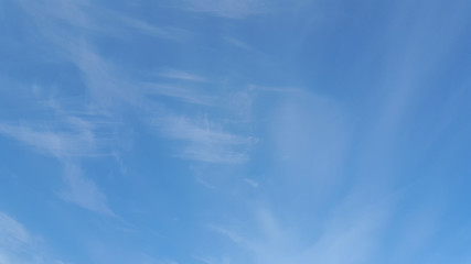 White cloudy and blue background