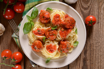Spaghetti pasta with meat balls and tomato suace