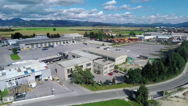 Company at the outskirts of a town