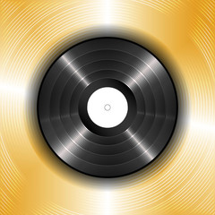 black vinyl record on a background of gold