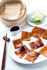 Peking duck set on the white tablecloth, one of famous Chinese food