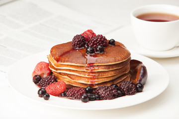 delicious pancakes on breakfast table