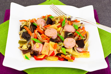 Chinese Vegetable Stew with Sausage. Paprika, Peas, Carrots. Die