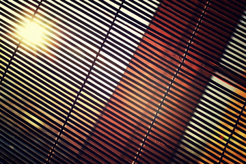 sun shining through the blinds