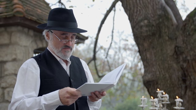 Composer reading a poem out laud 