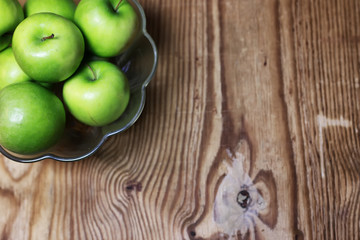green apple on a wooden background