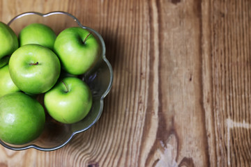 green apple on a wooden background