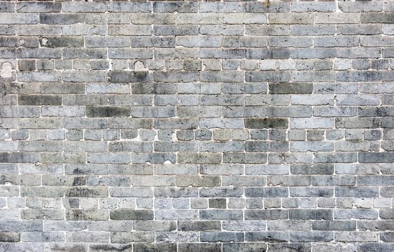 Grunge grey brick wall texture background