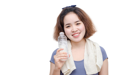 Young Asian girl holding drinking water bottle over white