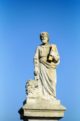 Fototapeta premium Heiliger Markus mit goldenem Buch und Löwen