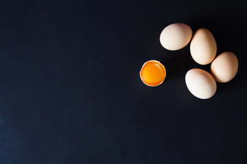 Several eggs on a black background