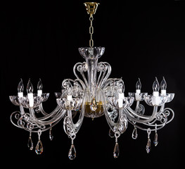 Elegant crystal strass chandelier with ten lamps.