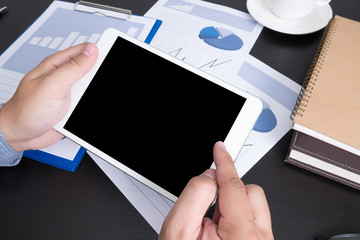 Modern people doing business, graphs and charts being demonstrat