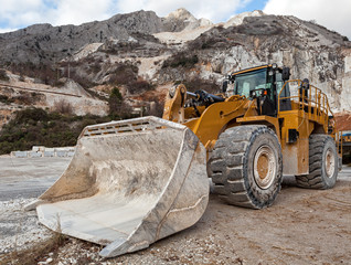 Large loader resting in the Carrara marble quarry, Tuscany, Italy.
