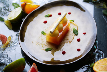 Hand made citrus tart with citrus fruits