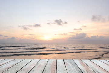Wooden floor.Background sunset over the sea