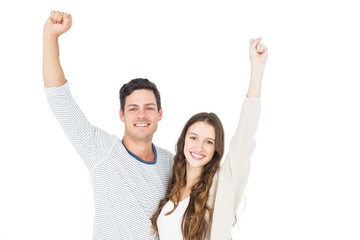 Triumphant couple raising fist