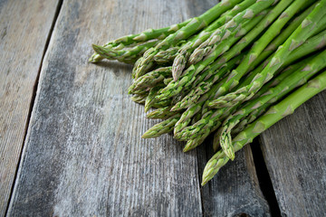 asparagus on wooden surface