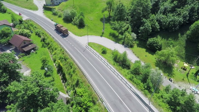 A big truck driving on a main road