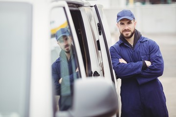 Repairman with arms crossed