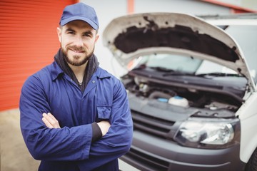 Mechanic with arms crossed