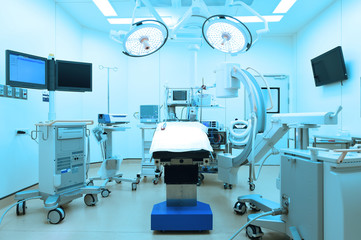 equipment and medical devices in modern operating room take with art lighting and blue filter