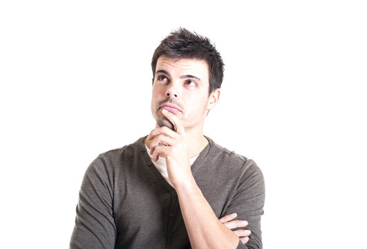 Portrait Of A Young Man Thinking On White Background