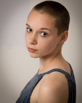 Beautiful Young Teenage Girl With Shaven Head