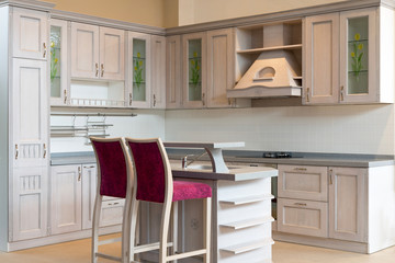 Modern kitchen interior with bar chairs