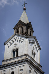Fototapeta na wymiar White christian church tower