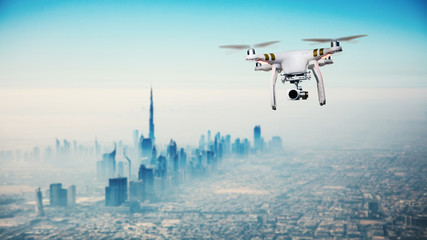 Drone flying above Dubai city panorama