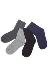 Four pairs of grey socks, isolated on white