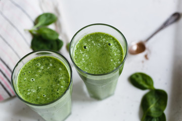 Two green smoothie in the glass