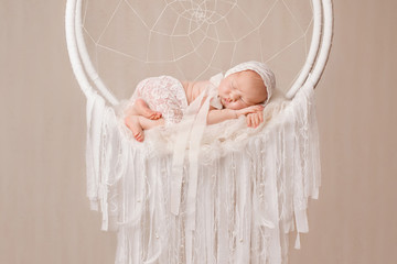 Little newborn girl 11 days, sleeps.Gentle newborn girl and drea