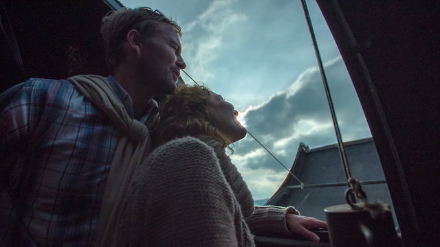 Romantic moment in the observatory while looking at the sky 