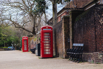 Classic red British telephone box in UK