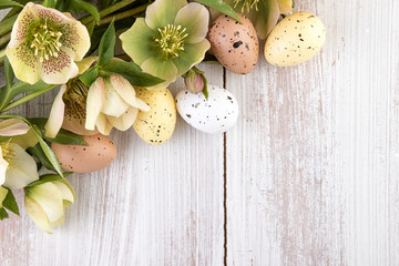 Easter decoration on light wood copy space
