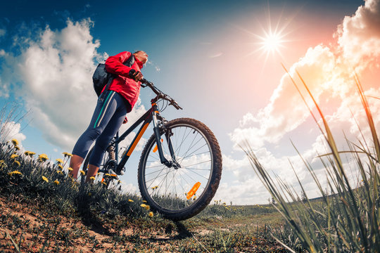 Lady with bicycle