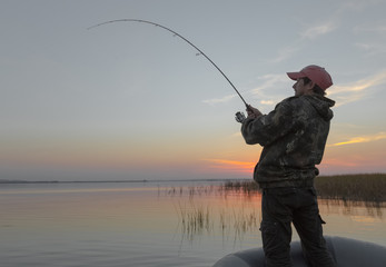 Man fishing on the lake
