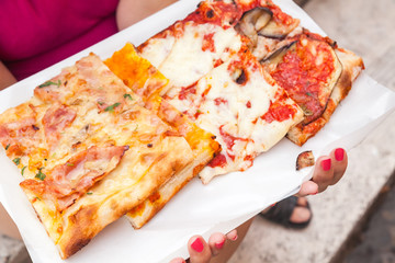 Slices of fresh different Italian Pizza
