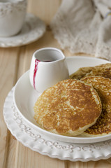 Pancake with jam from the black currant for a breakfast   