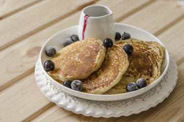 Pancake with jam from the black currant for a breakfast   