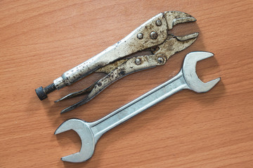 Wrench and spanner on wood background,concept for labors day and fathers day background.
