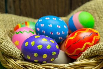 Fototapeta na wymiar Easter egg in the basket