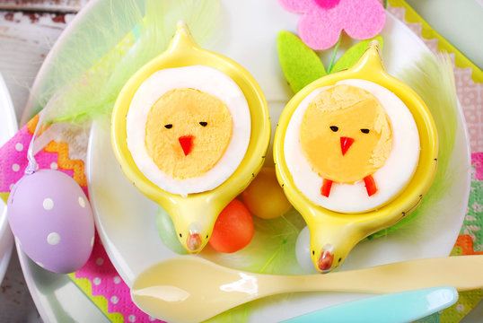 easter breakfast for kids with boiled eggs as chicks