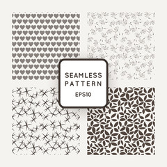 Set of four vector seamless patterns with flowers, hearts and stars