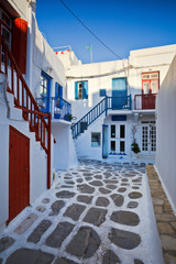 Traditional architecture in the town of Mykonos and characteristic narrow streets for pedestrians.