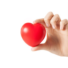 Obraz premium female hands with small red heart