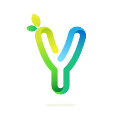 Y letter with green leaves eco logo.